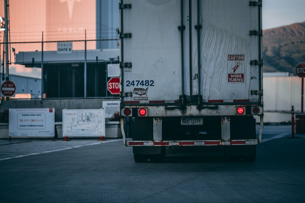 Truck’s trailer seen from behind.