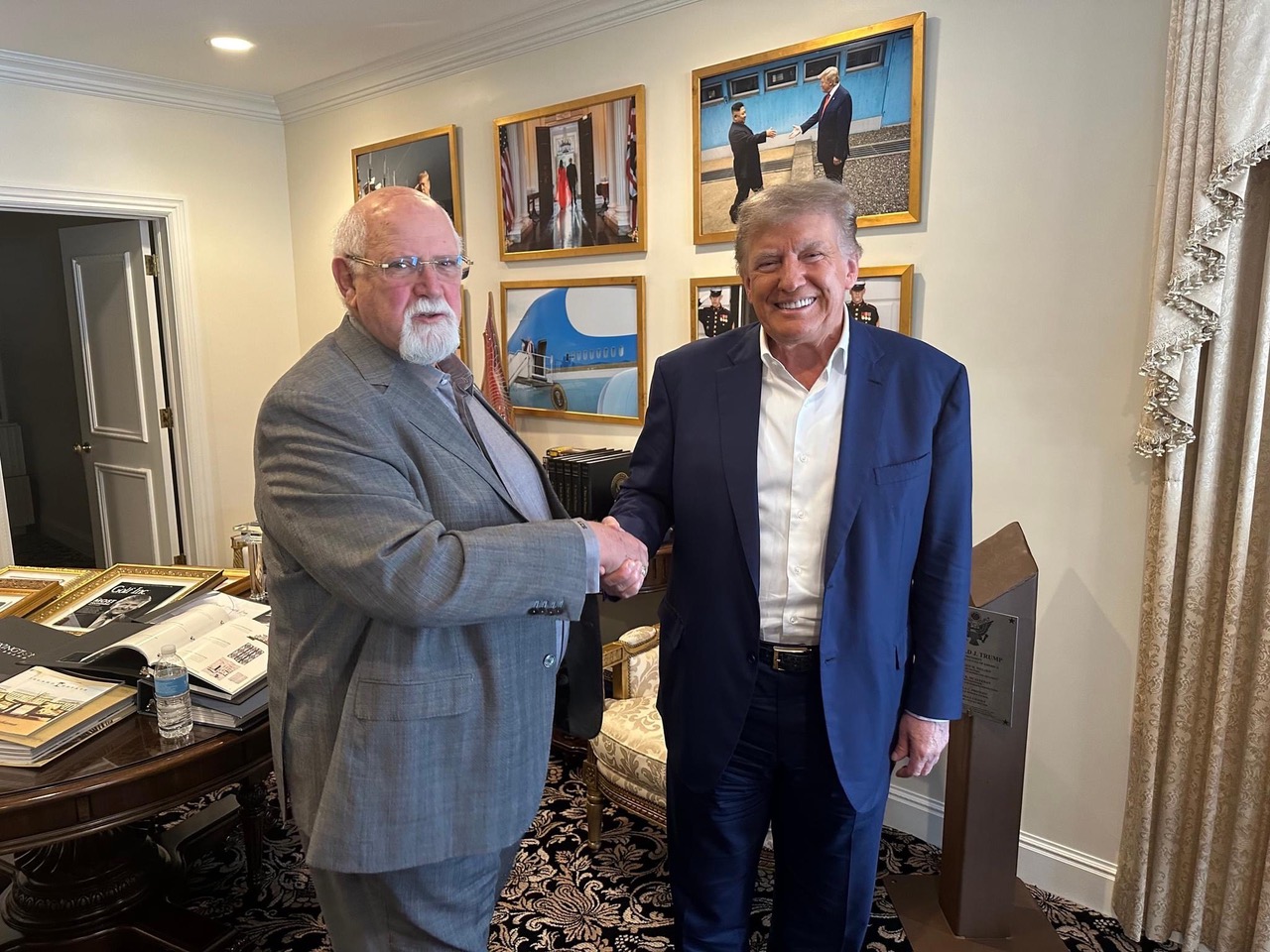 ILA image of union's President Harold Daggett shaking hands with President Trump.